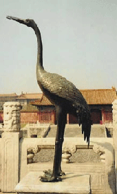 A statue of a black crane